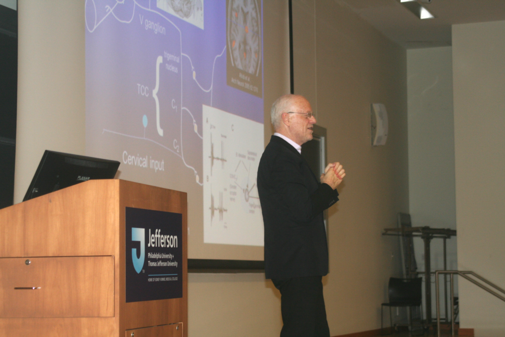 Peter Goadsby, MD, gives a lecture to the residents.